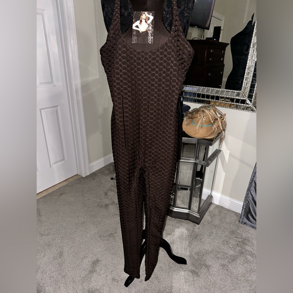 NWT. Naked Wardrobe sleeveless catsuit w/racer back.